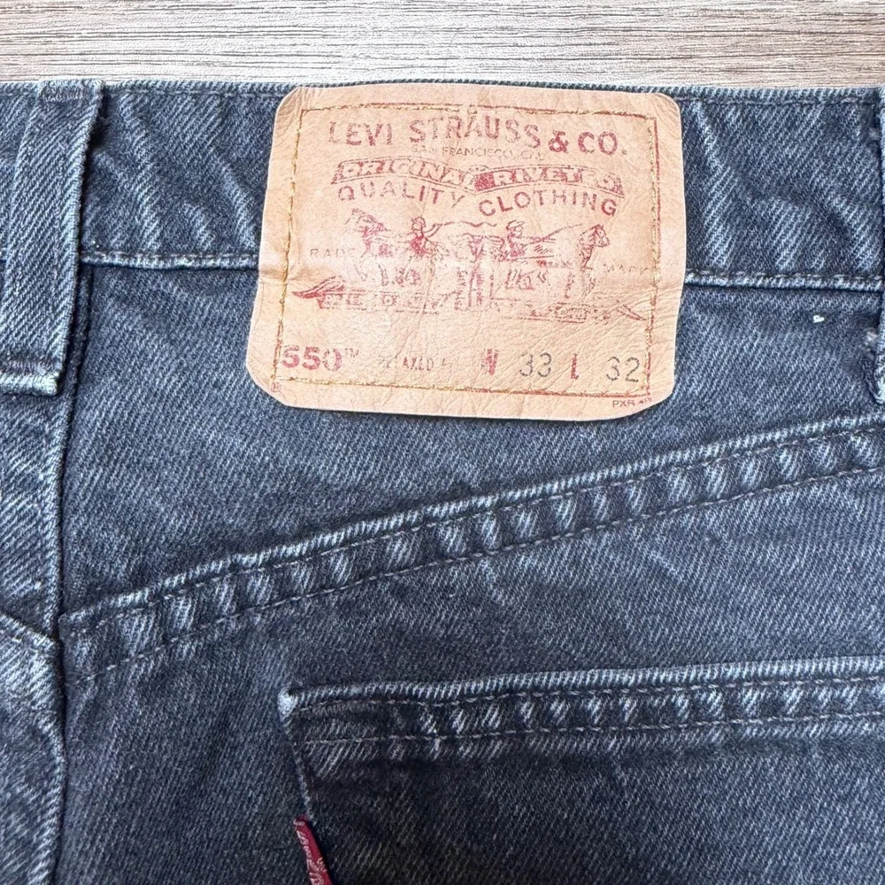 Vintage Levi's 550 Relaxed Fit Jeans Mens 33x32 Black Faded Tapered Made in USA